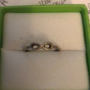 Silver and diamond ring